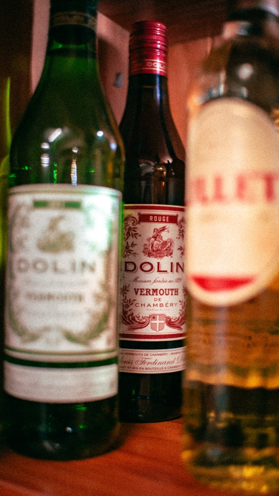 Bottles of Dolin vermouth and Lillet